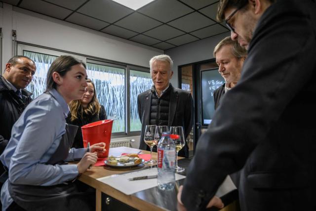French union Movement of the Enterprises of France (MEDEF) President Patrick Martin (C), visits the Cite des Formations et Apprentisages in Blagnac, southern France on February 11, 2026. (Photo by Ed JONES / AFP)
