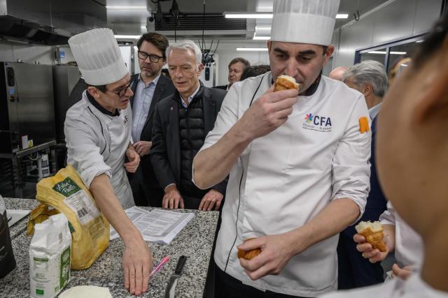 French union Movement of the Enterprises of France (MEDEF) President Patrick Martin (3L), visits the Cite des Formations et Apprentisages in Blagnac, southern France on February 11, 2026. (Photo by Ed JONES / AFP)