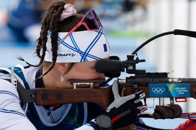 France's Camille Bened warms up ahead of the women's biathlon 15km individual event during the Milano Cortina 2026 Winter Olympic Games at the Anterselva Biathlon Arena (Sudtirol Arena) in Anterselva (Val Pusteria) on February 11, 2026. (Photo by Odd ANDERSEN / AFP)