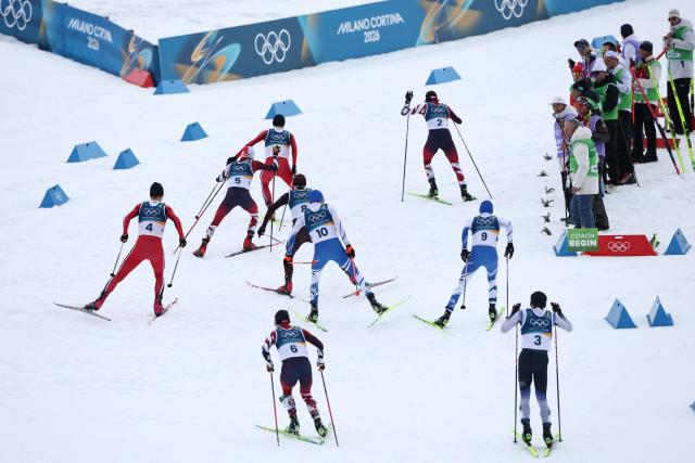 Athletes take part in the cross-country of the nordic combined individual Gundersen normal hill/10km competition event at Tesero Cross Country Stadium at Lago di Tesero (Val di Fiemme) during the Milano Cortina 2026 Winter Olympic Games on February 11, 2026. (Photo by Anne-Christine POUJOULAT / AFP)