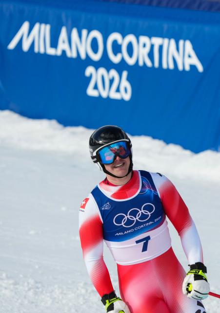 Switzerland's Franjo von Allmen smiles after finishing the men's super-G alpine skiing event during the Milano Cortina 2026 Winter Olympic Games at the Stelvio Ski Centre in Bormio (Valtellina) on February 11, 2026. (Photo by Dimitar DILKOFF / AFP)