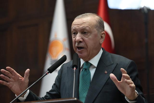 Turkish President and the leader of the Justice and Development Party (AKP) Recep Tayyip Erdogan gives a speech during his party's parliamentary group meeting at the Turkish Grand National Assembly in Ankara on February 11, 2025. (Photo by Adem ALTAN / AFP)