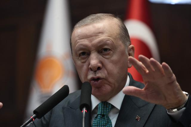 Turkish President and the leader of the Justice and Development Party (AKP) Recep Tayyip Erdogan gives a speech during his party's parliamentary group meeting at the Turkish Grand National Assembly in Ankara on February 11, 2025. (Photo by Adem ALTAN / AFP)