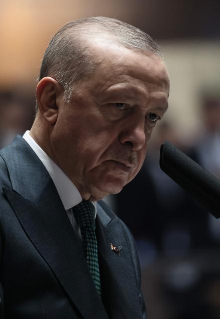 Turkish President and the leader of the Justice and Development Party (AKP) Recep Tayyip Erdogan looks on during his party's parliamentary group meeting at the Turkish Grand National Assembly in Ankara on February 11, 2025. (Photo by Adem ALTAN / AFP)