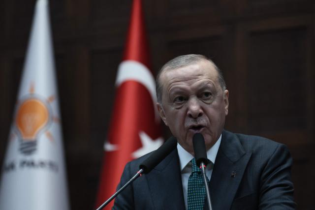 Turkish President and the leader of the Justice and Development Party (AKP) Recep Tayyip Erdogan gives a speech during his party's parliamentary group meeting at the Turkish Grand National Assembly in Ankara on February 11, 2025. (Photo by Adem ALTAN / AFP)