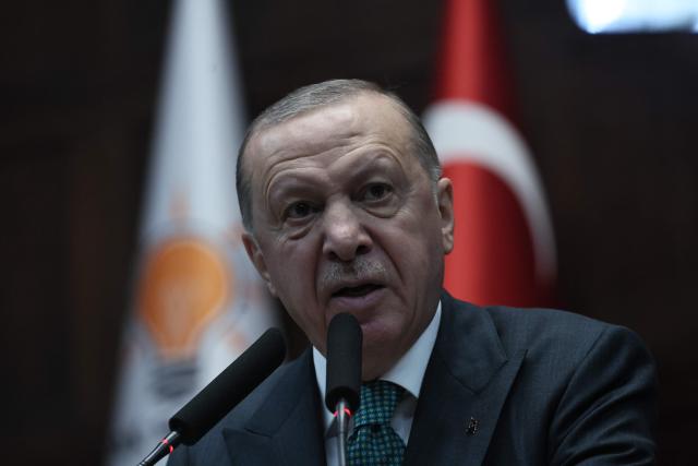 Turkish President and the leader of the Justice and Development Party (AKP) Recep Tayyip Erdogan gives a speech during his party's parliamentary group meeting at the Turkish Grand National Assembly in Ankara on February 11, 2025. (Photo by Adem ALTAN / AFP)