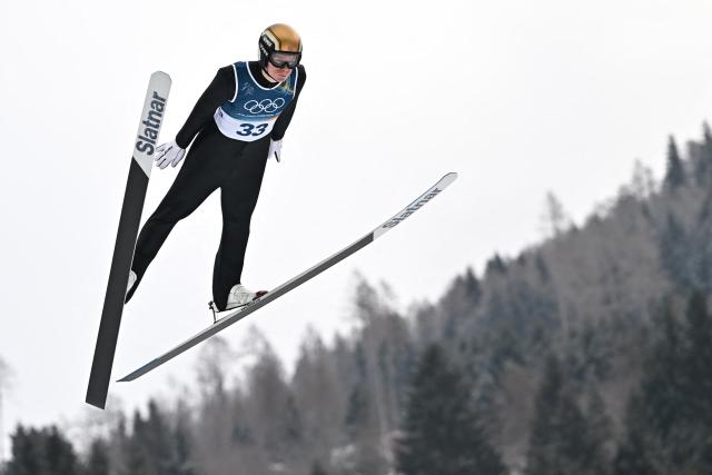 Norway's Einar Luraas Oftebro jumps in the competition round of the ski jumping of the nordic combined individual Gundersen normal hill/10km event at Predazzo Ski Jumping Stadium in Predazzo (Val di Fiemme) during the Milano Cortina 2026 Winter Olympic Games on February 11, 2026. (Photo by Javier SORIANO / AFP)