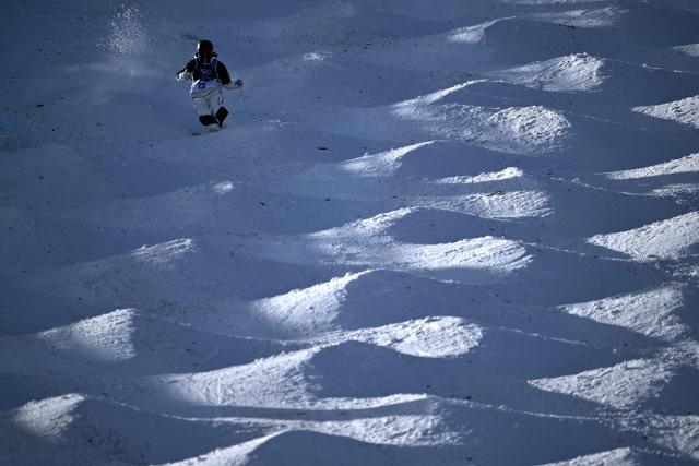 Australia's Charlotte Wilson competes in the freestyle skiing women's moguls final 1 during the Milano Cortina 2026 Winter Olympic Games at Livigno Aerials & Moguls Park, in Livigno (Valtellina), on February 11, 2026. (Photo by Kirill KUDRYAVTSEV / AFP)