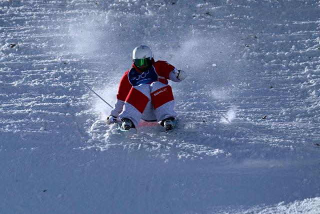 France's Camille Cabrol competes in the freestyle skiing women's moguls final 1 during the Milano Cortina 2026 Winter Olympic Games at Livigno Aerials & Moguls Park, in Livigno (Valtellina), on February 11, 2026. (Photo by Kirill KUDRYAVTSEV / AFP)