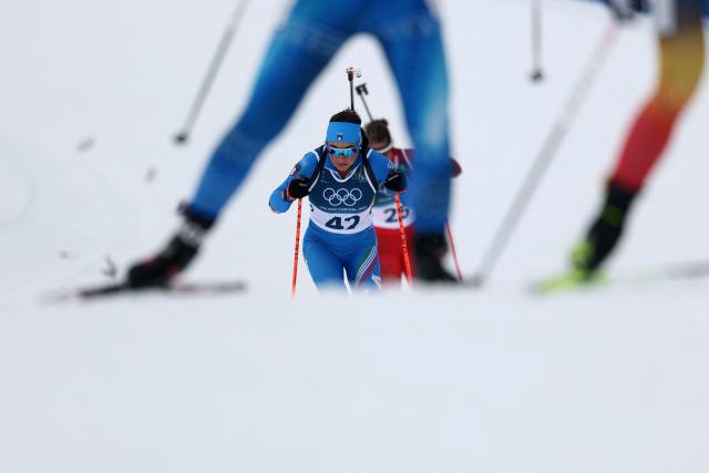 Italy's Dorothea Wierer skis in the women's biathlon 15km individual event during the Milano Cortina 2026 Winter Olympic Games at the Anterselva Biathlon Arena (Sudtirol Arena) in Anterselva (Val Pusteria) on February 11, 2026. (Photo by FRANCK FIFE / AFP)