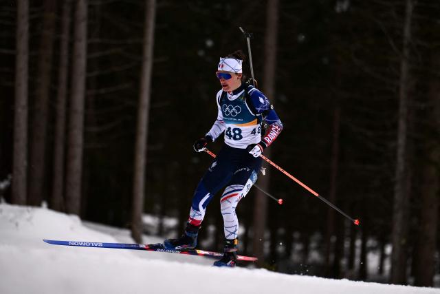 France's Julia Simon competes in the women's biathlon 15km individual event during the Milano Cortina 2026 Winter Olympic Games at the Anterselva Biathlon Arena (Sudtirol Arena) in Anterselva (Val Pusteria) on February 11, 2026. (Photo by Marco BERTORELLO / AFP)