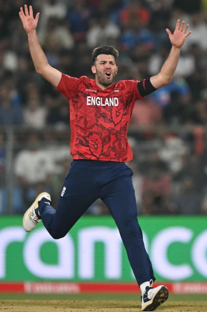 England's Jamie Overton reacts during the 2026 ICC Men's T20 Cricket World Cup group stage match between England and West Indies at the Wankhede Stadium in Mumbai on February 11, 2026. (Photo by Indranil MUKHERJEE / AFP)