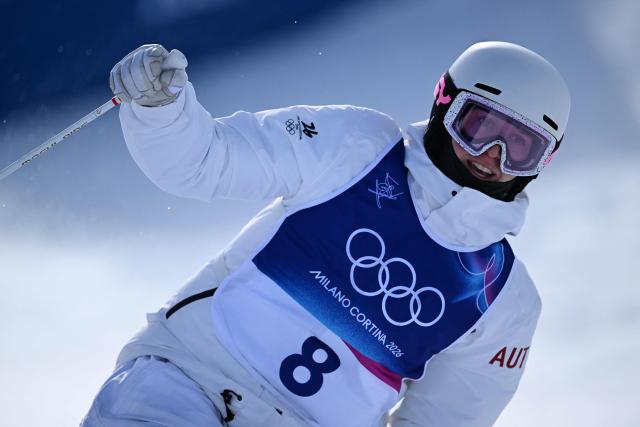 Austria's Avital Carroll reacts in the freestyle skiing women's moguls final 2 during the Milano Cortina 2026 Winter Olympic Games at Livigno Aerials & Moguls Park, in Livigno (Valtellina), on February 11, 2026. (Photo by Kirill KUDRYAVTSEV / AFP)