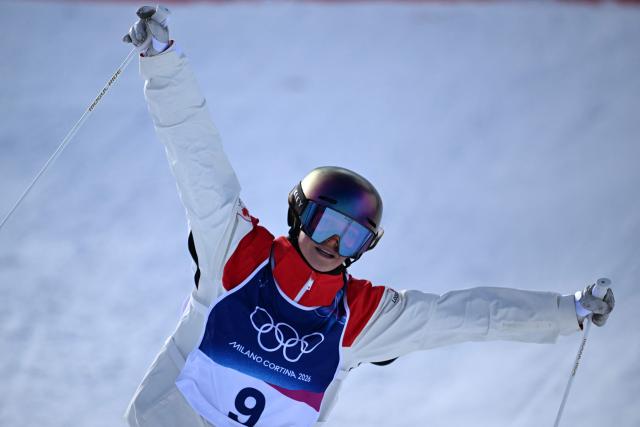 Canada's Maia Schwinghammer reacts in the freestyle skiing women's moguls final 2 during the Milano Cortina 2026 Winter Olympic Games at Livigno Aerials & Moguls Park, in Livigno (Valtellina), on February 11, 2026. (Photo by Kirill KUDRYAVTSEV / AFP)