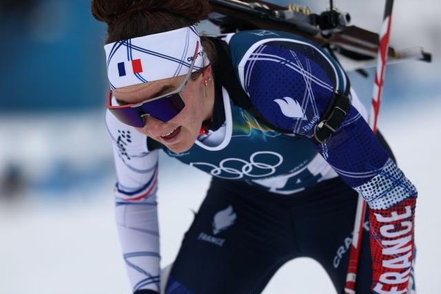 France's Lou Jeanmonnot reacts after the finish line in the women's biathlon 15km individual event during the Milano Cortina 2026 Winter Olympic Games at the Anterselva Biathlon Arena (Sudtirol Arena) in Anterselva (Val Pusteria) on February 11, 2026. (Photo by FRANCK FIFE / AFP)