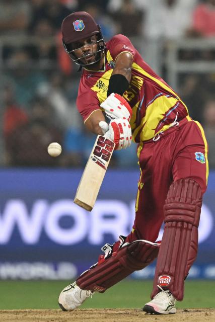 West Indies' Roston Chase plays a shot during the 2026 ICC Men's T20 Cricket World Cup group stage match between England and West Indies at the Wankhede Stadium in Mumbai on February 11, 2026. (Photo by Indranil MUKHERJEE / AFP)