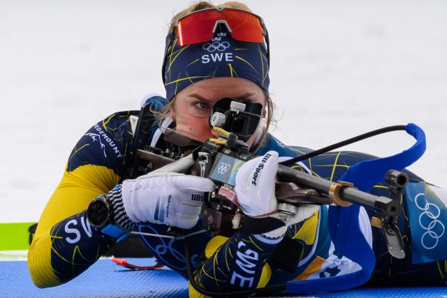 Sweden's Anna Magnusson shoots in the women's biathlon 15km individual event during the Milano Cortina 2026 Winter Olympic Games at the Anterselva Biathlon Arena (Sudtirol Arena) in Anterselva (Val Pusteria) on February 11, 2026. (Photo by FRANCOIS-XAVIER MARIT / AFP)