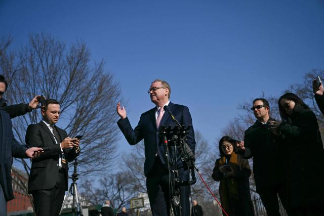 Director of the National Economic Council Kevin Hassett speaks with reporters outside of the West Wing at the White House in Washington, DC on February 11, 2025. (Photo by Brendan SMIALOWSKI / AFP)