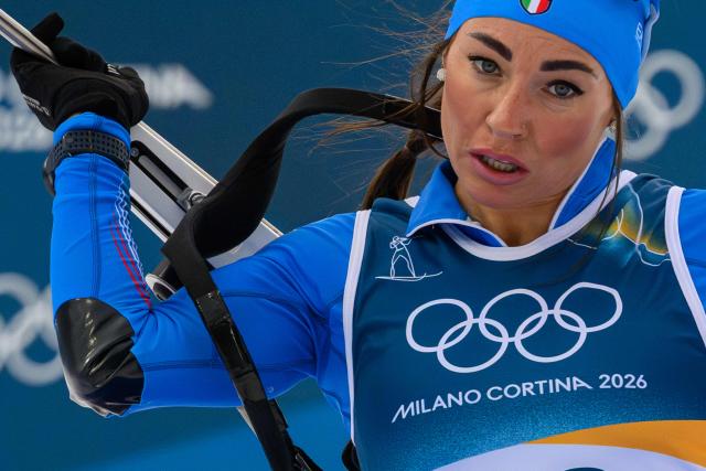 Italy's Dorothea Wierer prepares to shoot in the women's biathlon 15km individual event during the Milano Cortina 2026 Winter Olympic Games at the Anterselva Biathlon Arena (Sudtirol Arena) in Anterselva (Val Pusteria) on February 11, 2026. (Photo by FRANCOIS-XAVIER MARIT / AFP)