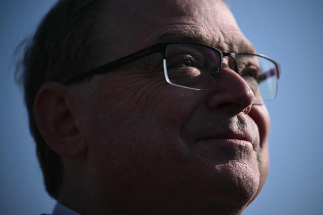 Director of the National Economic Council Kevin Hassett speaks with reporters outside of the West Wing at the White House in Washington, DC on February 11, 2025. (Photo by Brendan SMIALOWSKI / AFP)