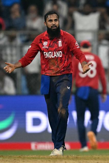 England's Adil Rashid reacts after a delivery during the 2026 ICC Men's T20 Cricket World Cup group stage match between England and West Indies at the Wankhede Stadium in Mumbai on February 11, 2026. (Photo by Indranil MUKHERJEE / AFP)
