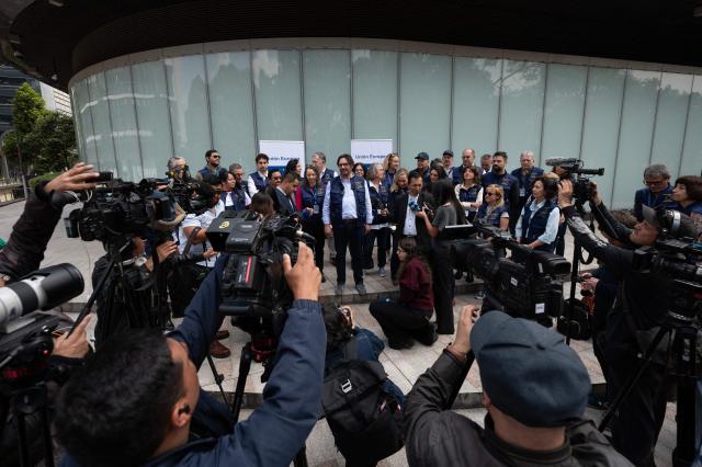 Deputy Chief of the EU Election Observation Mission to Colombia 2026, Jose Antonio de Gabriel (C), delivers a press conference in Bogota on February 11, 2026. Colombia's presidential election is scheduled for May 31, 2026. (Photo by Diana SANCHEZ / AFP)