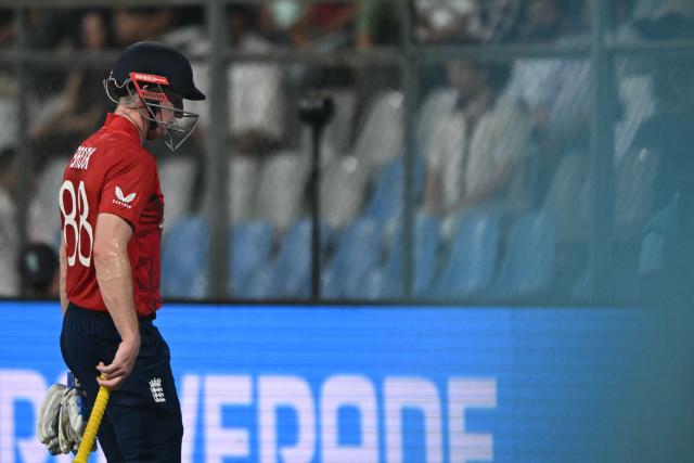 England's captain Harry Brook walks back to the pavilion after his dismissal during the 2026 ICC Men's T20 Cricket World Cup group stage match between England and West Indies at the Wankhede Stadium in Mumbai on February 11, 2026. (Photo by Indranil MUKHERJEE / AFP)