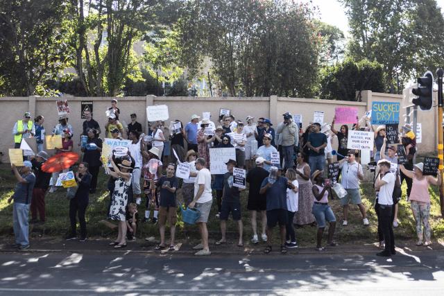 Protesters gather during a demonstration against water restrictions in Johannesburg, on February 11, 2026. Several parts of South Africa's economic capital -- from wealthy areas to the poorer ones -- have been gripped by weeks-long water shortages as decades of infrastructural decay and lack of maintenance push the system to the brink.
In other areas of the country, including the southern city of Cape Town, shortages due to prolonged droughts were last week declared a national disaster.
This meant restrictions could be imposed to avoid a dreaded "Day Zero", when the taps run dry. (Photo by ILARIA FINIZIO / AFP)
