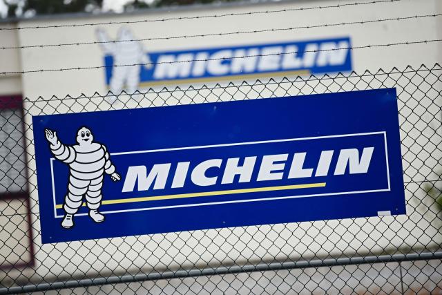 (FILES) The logo of French car tire maker Michelin is seen at its plant in Hallstadt near Bamberg, southern Germany, on September 25, 2019. Tyre manufacturer Michelin saw its net profit fall by 12% to Ђ1.7 billion in 2025, hit by lower sales volumes, higher customs duties imposed by the United States and the stronger euro. (Photo by Nicolas Armer / AFP)