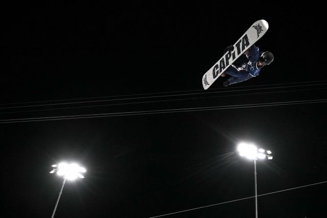 USA's Chase Josey competes in the snowboard men's halfpipe qualification run 1 during the Milano Cortina 2026 Winter Olympic Games at Livigno Snow Park, in Livigno (Valtellina), on February 11, 2026. (Photo by Jeff PACHOUD / AFP)