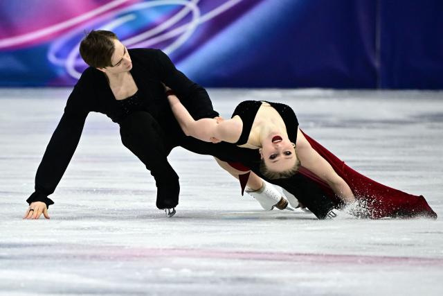 Czech Republic's Katerina Mrazkova and Czech Republic's Daniel Mrazek compete in the figure skating ice dance-free dance final during the Milano Cortina 2026 Winter Olympic Games at Milano Ice Skating Arena in Milan on February 11, 2026. (Photo by JULIEN DE ROSA / AFP)