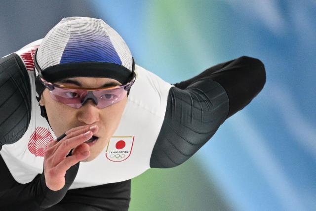 Japan's Taiyo Nonomura competes in the speed skating men's 1000m during the Milano Cortina 2026 Winter Olympic Games at Milano Speed Skating Stadium in Milan on February 11, 2026. (Photo by Daniel MUNOZ / AFP)