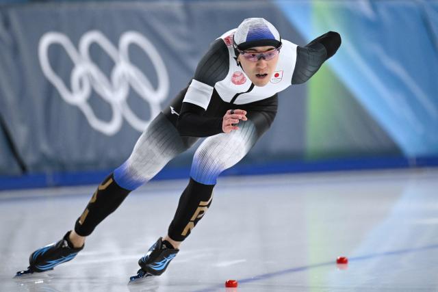 Japan's Taiyo Nonomura competes in the speed skating men's 1000m during the Milano Cortina 2026 Winter Olympic Games at Milano Speed Skating Stadium in Milan on February 11, 2026. (Photo by Daniel MUNOZ / AFP)