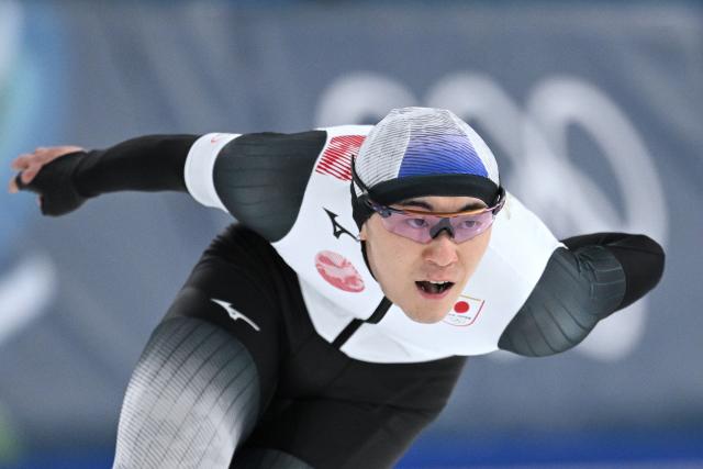 Japan's Taiyo Nonomura competes in the speed skating men's 1000m during the Milano Cortina 2026 Winter Olympic Games at Milano Speed Skating Stadium in Milan on February 11, 2026. (Photo by Daniel MUNOZ / AFP)