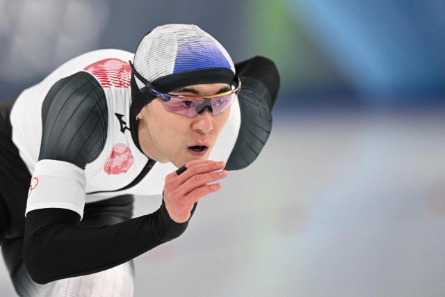 Japan's Taiyo Nonomura competes in the speed skating men's 1000m during the Milano Cortina 2026 Winter Olympic Games at Milano Speed Skating Stadium in Milan on February 11, 2026. (Photo by Daniel MUNOZ / AFP)