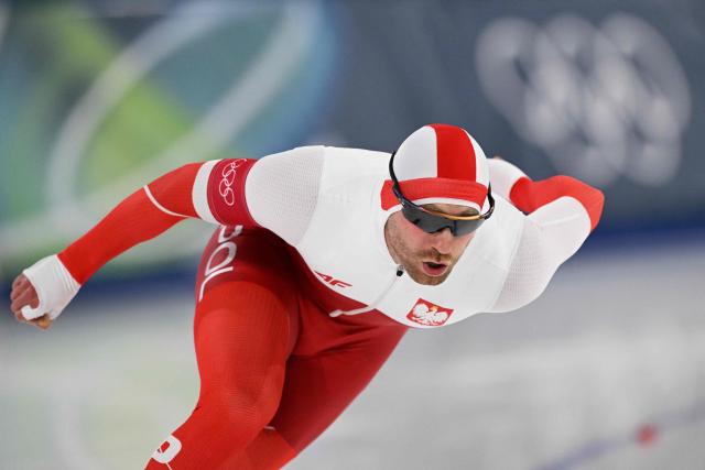 Poland's Damian Zurek competes in the speed skating men's 1000m during the Milano Cortina 2026 Winter Olympic Games at Milano Speed Skating Stadium in Milan on February 11, 2026. (Photo by Daniel MUNOZ / AFP)