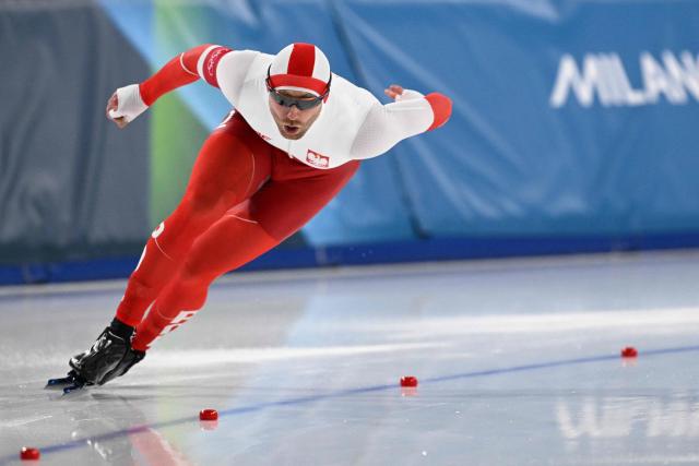 Poland's Damian Zurek competes in the speed skating men's 1000m during the Milano Cortina 2026 Winter Olympic Games at Milano Speed Skating Stadium in Milan on February 11, 2026. (Photo by Daniel MUNOZ / AFP)