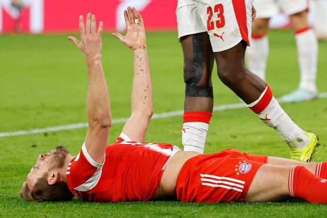Bayern Munich's English forward #09 Harry Kane reacts during the German Cup (DFB-Pokal) quarter-final football match between FC Bayern Munich and RB Leipzig in Munich, southern Germany on February 11, 2026. (Photo by Alexandra BEIER / AFP) / DFB REGULATIONS PROHIBIT ANY USE OF PHOTOGRAPHS AS IMAGE SEQUENCES AND QUASI-VIDEO.