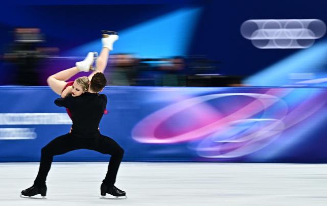 Finland's Juulia Turkkila and Finland's Matthias Versluis compete in the figure skating ice dance-free dance final during the Milano Cortina 2026 Winter Olympic Games at Milano Ice Skating Arena in Milan on February 11, 2026. (Photo by JULIEN DE ROSA / AFP)
