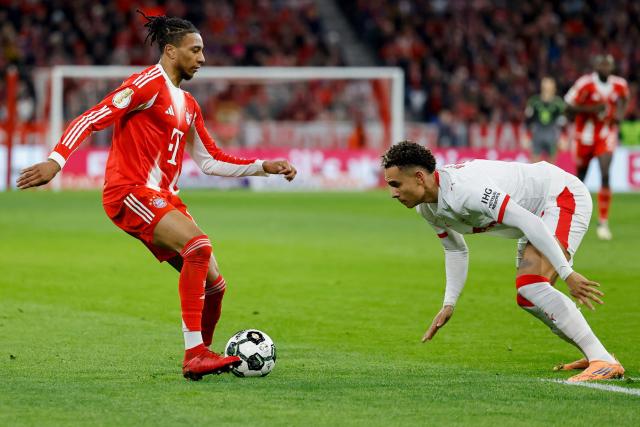 Bayern Munich's French midfielder #17 Michael Olise (L) and Leipzig's Norwegian forward #07 Antonio Nusa vie for the ball during the German Cup (DFB-Pokal) quarter-final football match between FC Bayern Munich and RB Leipzig in Munich, southern Germany on February 11, 2026. (Photo by Alexandra BEIER / AFP) / DFB REGULATIONS PROHIBIT ANY USE OF PHOTOGRAPHS AS IMAGE SEQUENCES AND QUASI-VIDEO.