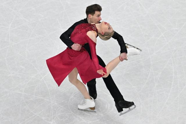 Finland's Juulia Turkkila and Finland's Matthias Versluis compete in the figure skating ice dance-free dance final during the Milano Cortina 2026 Winter Olympic Games at Milano Ice Skating Arena in Milan on February 11, 2026. (Photo by Antonin THUILLIER / AFP)