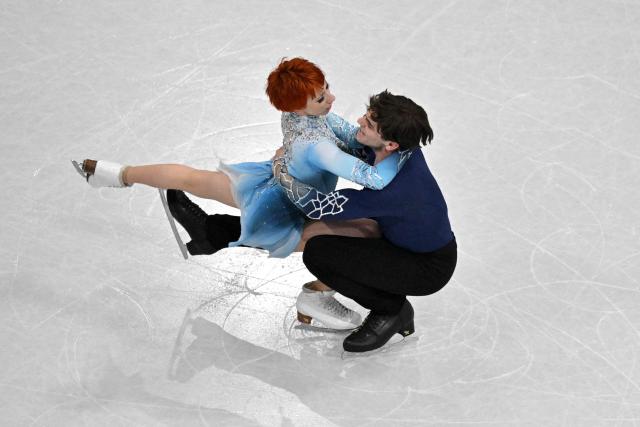 France's Evgeniia Lopareva and France's Geoffrey Brissaud compete in the figure skating ice dance-free dance final during the Milano Cortina 2026 Winter Olympic Games at Milano Ice Skating Arena in Milan on February 11, 2026. (Photo by Antonin THUILLIER / AFP)