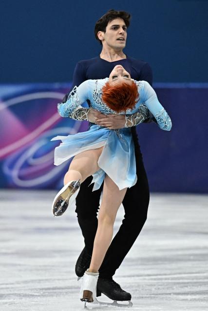 France's Evgeniia Lopareva and France's Geoffrey Brissaud compete in the figure skating ice dance-free dance final during the Milano Cortina 2026 Winter Olympic Games at Milano Ice Skating Arena in Milan on February 11, 2026. (Photo by Gabriel BOUYS / AFP)