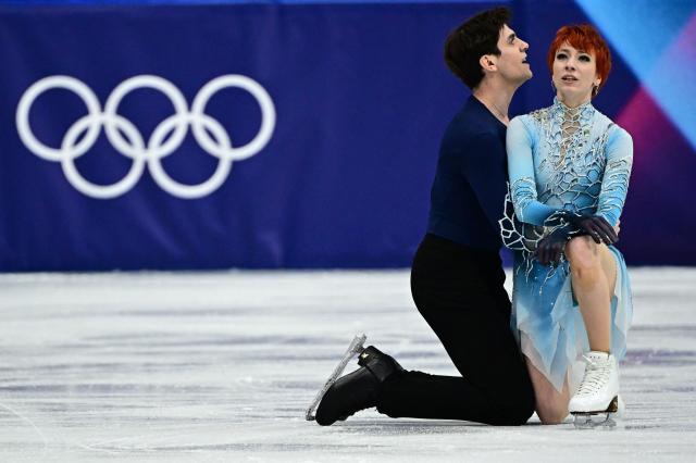 France's Evgeniia Lopareva and France's Geoffrey Brissaud compete in the figure skating ice dance-free dance final during the Milano Cortina 2026 Winter Olympic Games at Milano Ice Skating Arena in Milan on February 11, 2026. (Photo by JULIEN DE ROSA / AFP)