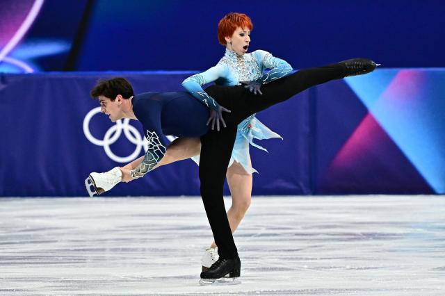 France's Evgeniia Lopareva and France's Geoffrey Brissaud compete in the figure skating ice dance-free dance final during the Milano Cortina 2026 Winter Olympic Games at Milano Ice Skating Arena in Milan on February 11, 2026. (Photo by JULIEN DE ROSA / AFP)