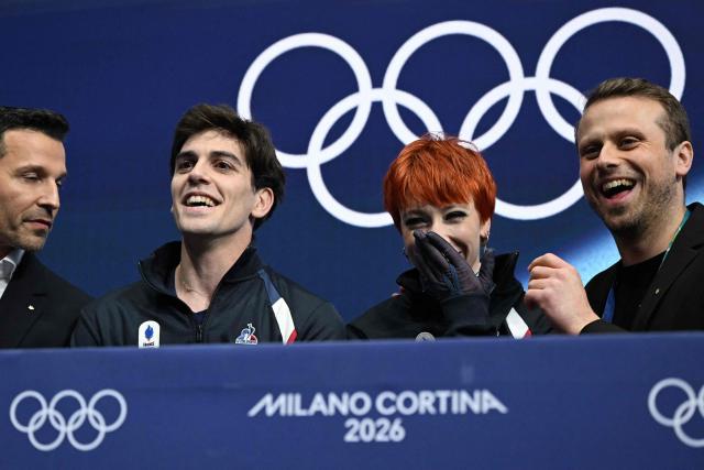 France's Evgeniia Lopareva and France's Geoffrey Brissaud react in the kiss and cry area after competing in the figure skating ice dance-free dance final during the Milano Cortina 2026 Winter Olympic Games at Milano Ice Skating Arena in Milan on February 11, 2026. (Photo by Gabriel BOUYS / AFP)