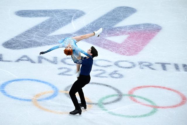 France's Evgeniia Lopareva and Geoffrey Brissaud compete in the figure skating ice dance-free dance final during the Milano Cortina 2026 Winter Olympic Games at Milano Ice Skating Arena in Milan on February 11, 2026. (Photo by WANG Zhao / AFP)