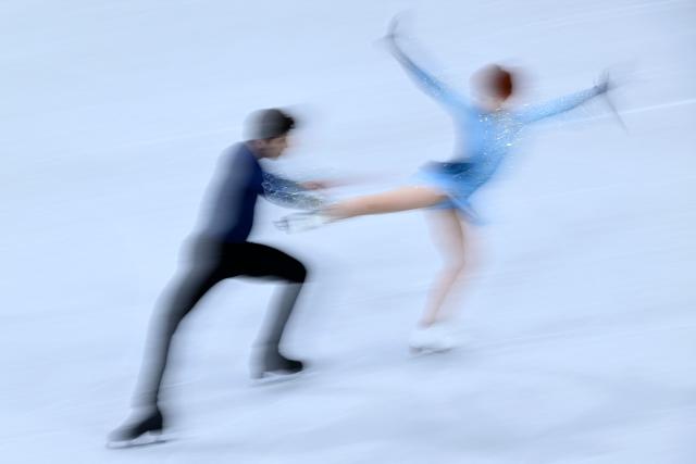 France's Evgeniia Lopareva and Geoffrey Brissaud compete in the figure skating ice dance-free dance final during the Milano Cortina 2026 Winter Olympic Games at Milano Ice Skating Arena in Milan on February 11, 2026. (Photo by WANG Zhao / AFP)