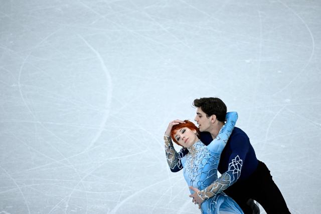 France's Evgeniia Lopareva and Geoffrey Brissaud compete in the figure skating ice dance-free dance final during the Milano Cortina 2026 Winter Olympic Games at Milano Ice Skating Arena in Milan on February 11, 2026. (Photo by WANG Zhao / AFP)