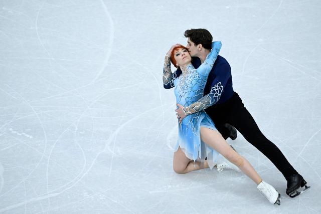 France's Evgeniia Lopareva and Geoffrey Brissaud compete in the figure skating ice dance-free dance final during the Milano Cortina 2026 Winter Olympic Games at Milano Ice Skating Arena in Milan on February 11, 2026. (Photo by WANG Zhao / AFP)